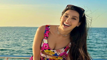 ফুটবলারের ড্রিবলিংয়ে কুপোকাত নোরার মন! 